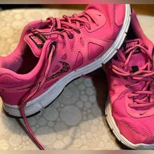 Hot pink and cheetah print Nike Revolutions